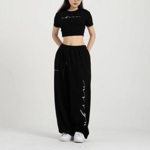 Женские джоггеры в стиле Y2K с высокой талией и шнуровкой — это модные и удобные брюки, идеально подходящие для танцев, уличной моды и повседневного ношения.